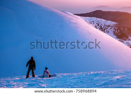 The valley is lit by the charming evening light. Frosty day on ski resort. Location Carpathian, Ukraine, Europe. Picture of wild area. Explore the beauty of earth. Scenic image of hiking concept. 