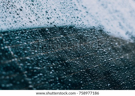 rear window of a car in the rain