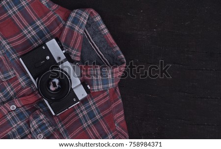 the old camera flies on the shirt