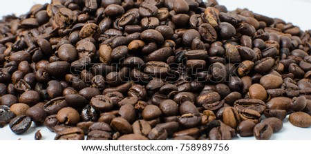 Roasted coffee beans to prepare a hot drink.