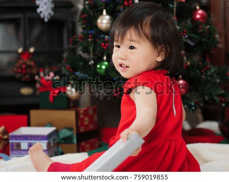 Baby Girl celebrating Christmas at home