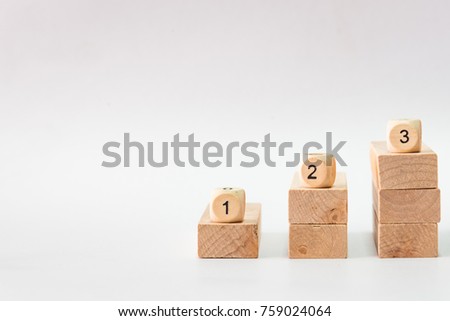 Wood block stacking as step up stair with sequence number. Business concept for growth success process or building concept. Royalty-Free Stock Photo #759024064
