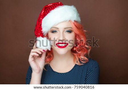 Portrait of young woman - isolated photo. Xmas New Year hairstyle and make up. Beauty Girl portrait. Snowflakes, professional makeup, red lipstick