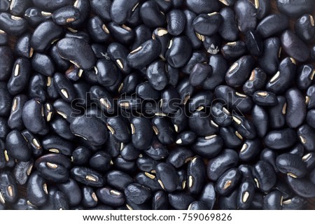 black bean on background.top view Royalty-Free Stock Photo #759069826