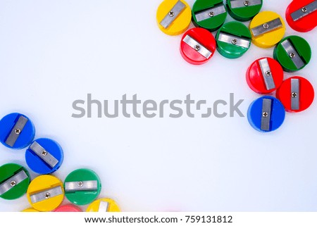 Pencil sharpeners on white background, space