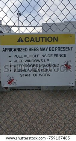 Africanized bee warning sign