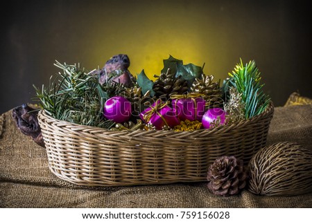 Christmas elment in basket on dark background