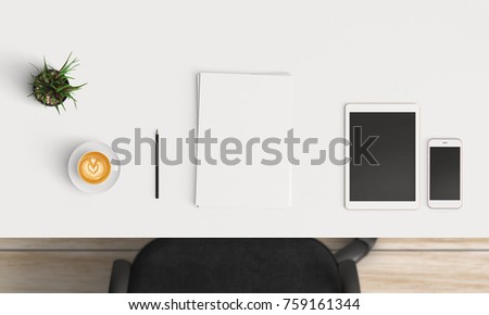 Modern workplace with coffee cup and smartphone or laptop copy space on white table background. Top view. Flat lay style.