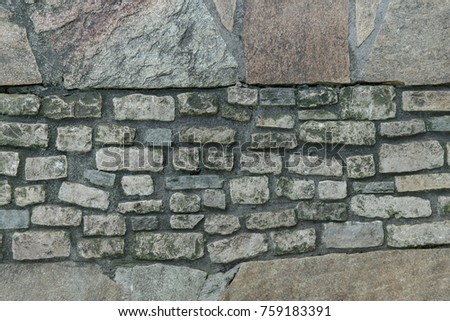 Flat stone bricks and rocky blocks ornate wall texture, stone surface closeup. Grunge wall background, building decoration, vintage decor