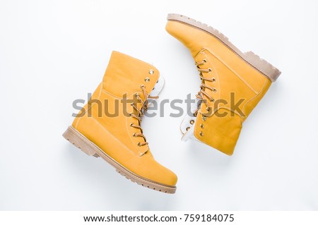 Hiking boots on a white background Royalty-Free Stock Photo #759184075