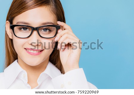 Young woman wearing eyeglasses.