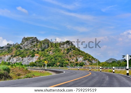 road sharp curves in country side hill background Thailand.