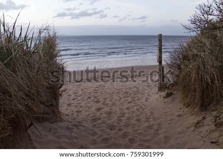 Path leads onto secluded beach