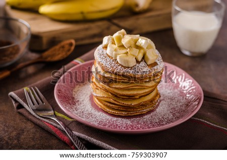 American pancakes with banana, chocolate, delish photo for advertisment