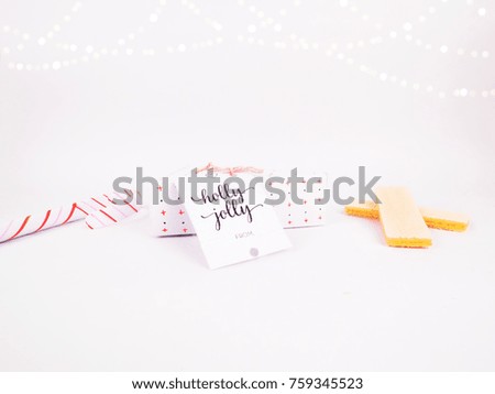 Christmas Decoration with Red Triangle Wafers Gift Box with Wafers and candy canes with golden bokeh garland for holidays best for background image for Holiday invitation and banners and blogs