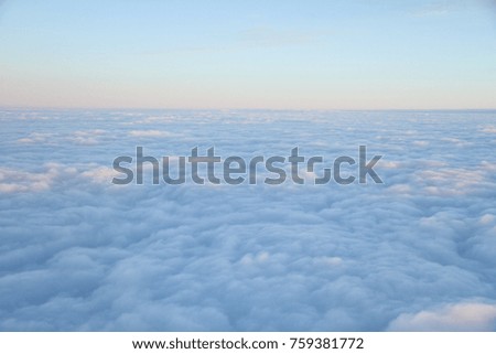 Bed of clouds shot from plane window