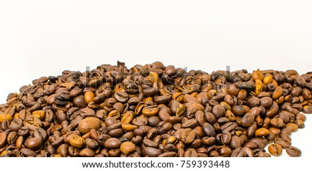 Roasted coffee beans to prepare a hot drink.