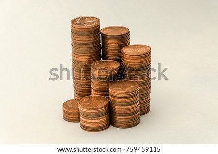 Growing mountain of coins in denomination of two euro cents isolated on white background