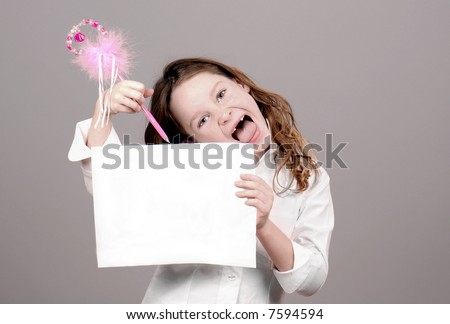 Young Girl Holding Up Note Paper with Fancy Girly Pen in Hand