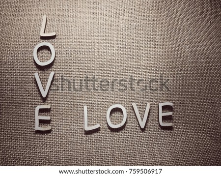 Love message on natural textile background texture