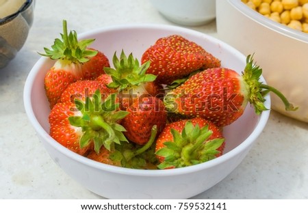 Fresh delicious sweet strawberries only from the bed.