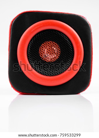 Red Cube Speaker Isolated Over White Background