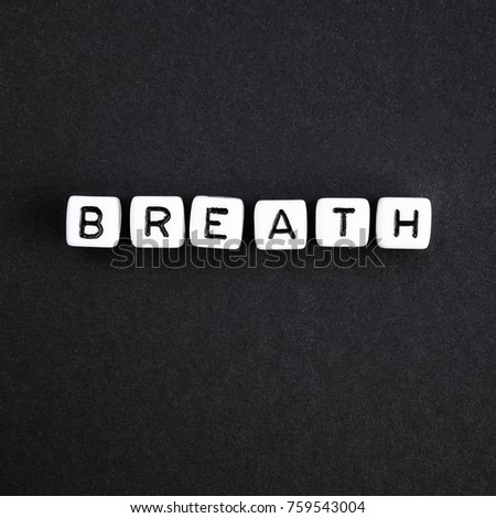 Breath word square composition. Black and white photo