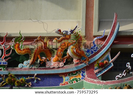 Dragon Chinese Decoration On Buddhist Temple Roof