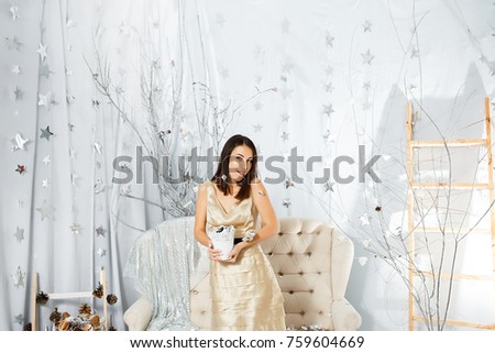 Girl on New Year party in light colors
