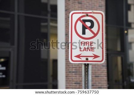 Fire Lane No Parking Sign Outside Royalty-Free Stock Photo #759637750