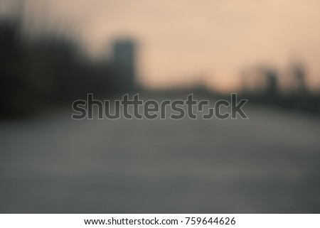 Blurred background, silhouettes of city houses. Design Template. Text.
