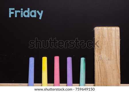 Friday on Blackboard with chalk  and eraser