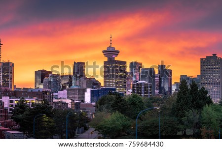Colourful sunset behind the downtown Vancouver Skyline.