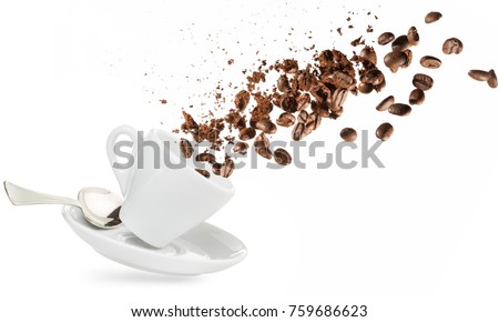 coffee beans and powder spilling out of a cup isolated on white Royalty-Free Stock Photo #759686623