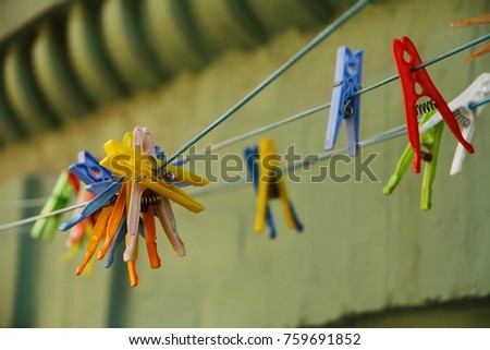 Colorful clothespins on the string