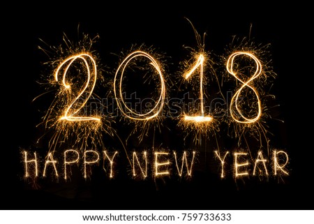 Happy new year 2018 written with Sparkle firework Royalty-Free Stock Photo #759733633