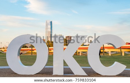 Skyline of Oklahoma City, OK with OKC sign