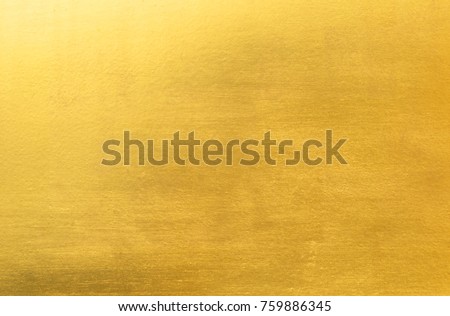 Shiny yellow leaf gold foil texture background Royalty-Free Stock Photo #759886345