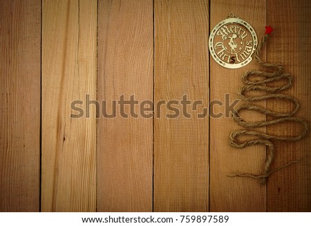 Beautiful christmas tree on wooden background.