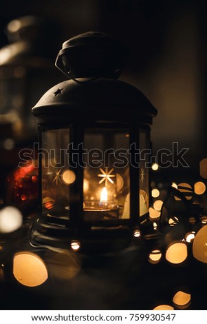 Christmas gifts in candles and lanterns
