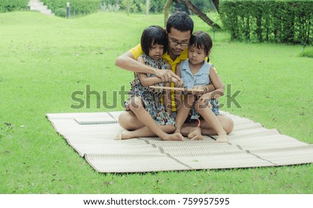 Father And Child Happy Draw Picture In Park
