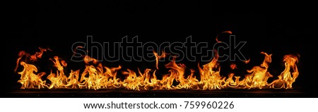Fire flames on black background. Royalty-Free Stock Photo #759960226