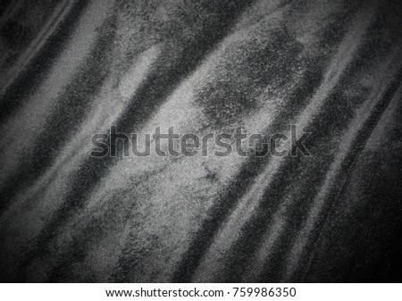 A black velvet texture/wallpaper design with a dark vignette border.