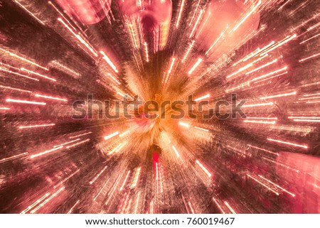 light lines with long exposure,  speed motion abstract background in the dark night ,  blast zoom effect , zoom burst light of christmas tree