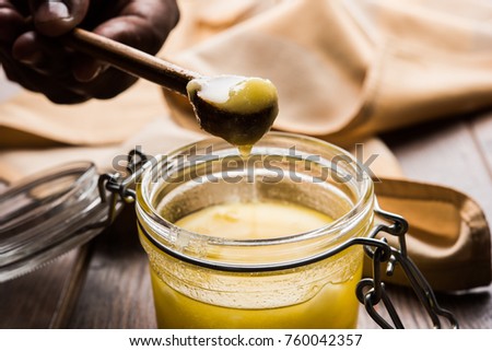 Desi  shuddha Ghee or clarified butter close up picture, selective focus

