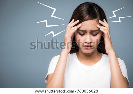 young woman having a headache.