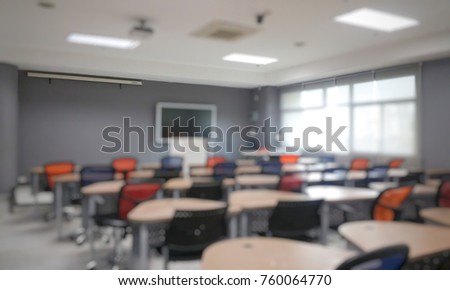 blurred school classroom without young student.