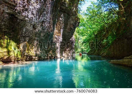 Martvili canyon in Georgia. Beautiful natural canyon with view of the mountain river, christal blue water and boat ride near Kutaisi Royalty-Free Stock Photo #760076083
