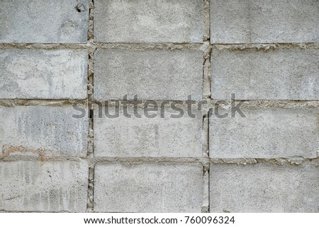 Abstract weathered texture stained old stucco light gray and paint white. Surface of old cement wall for the design texture background. Brick wall background in rural room.