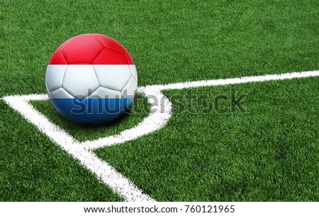 The flag of Luxembourg is depicted on a football, with a good place for your text